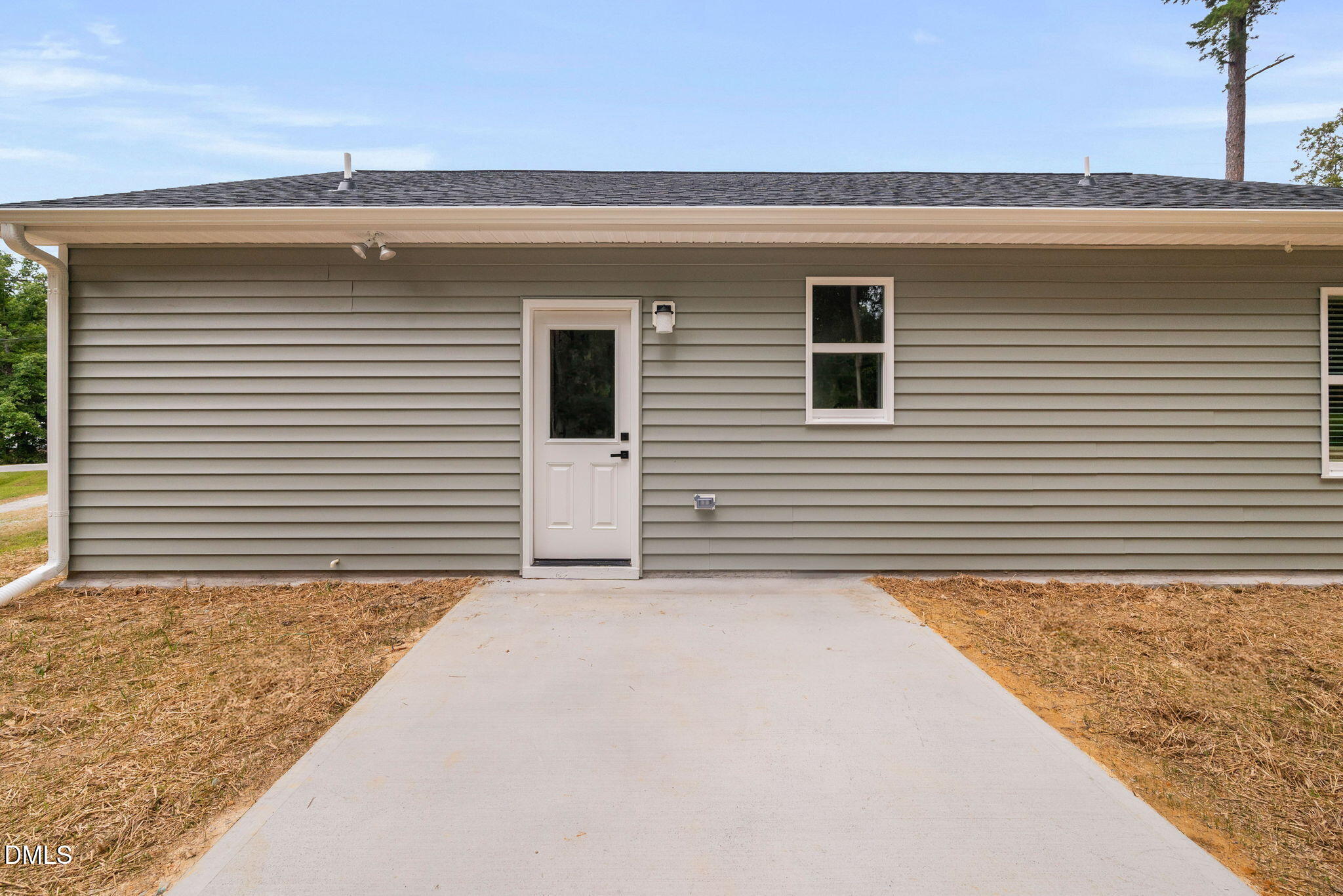 183 Magnolia Drive Roxboro, NC 27573 - Photo 7 of 31 a view of a house with a yard