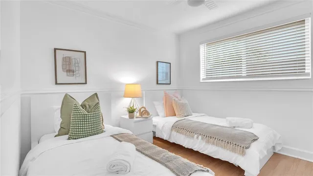 a bedroom with a bed and a couch