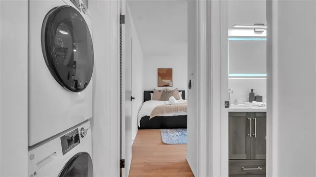 a view of hallway with washer and dryer