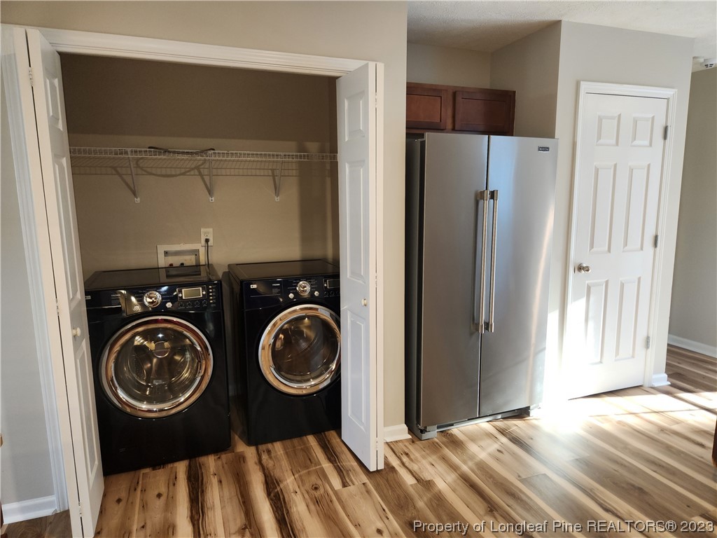 268 Cape Fear Road Raeford, NC 28376 - Photo 5 of 13 a view of a bedroom with washer and dryer