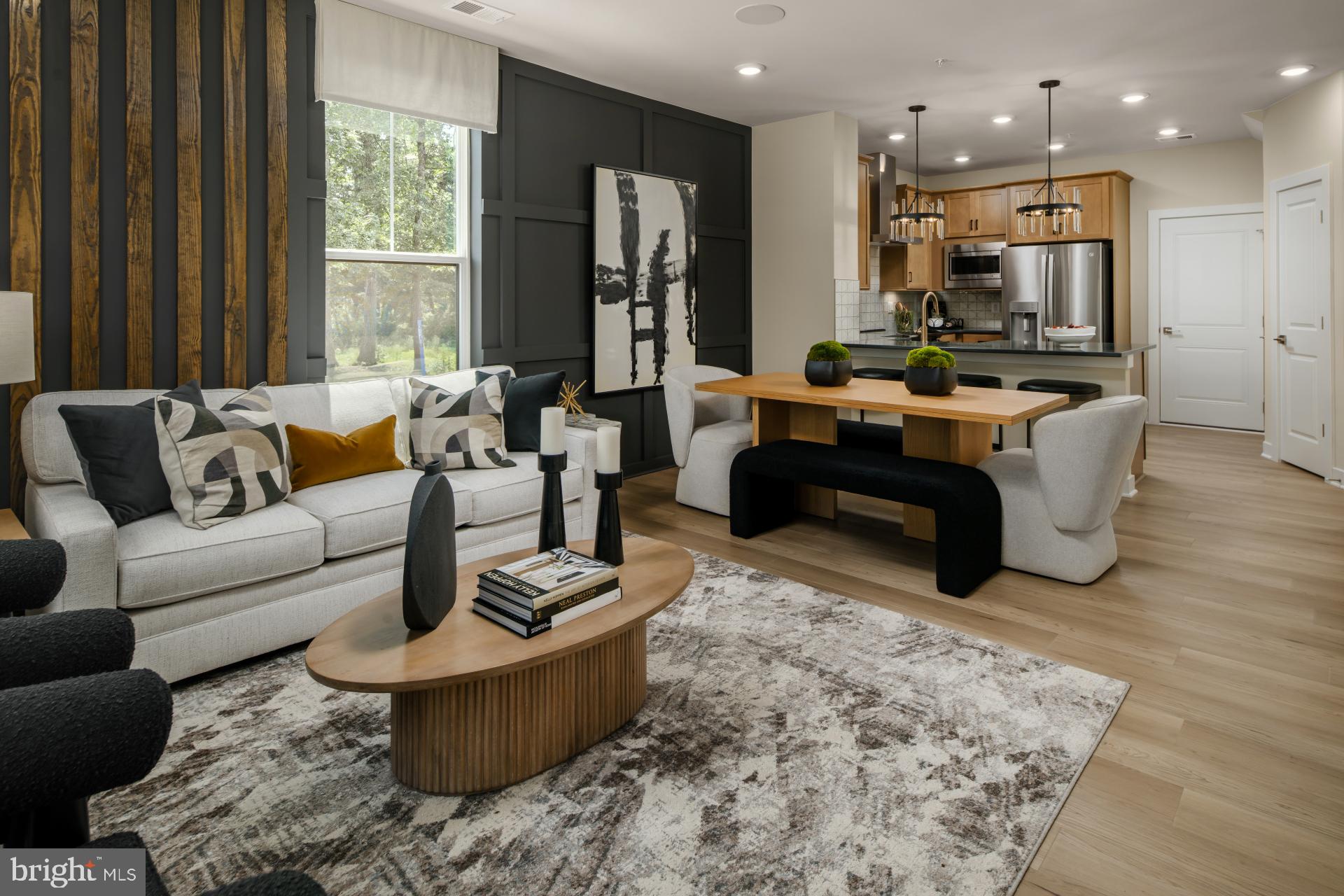 39 Strabane Terrace Ashburn, VA 20147 - Photo 1 of 15 a living room with furniture and a large window