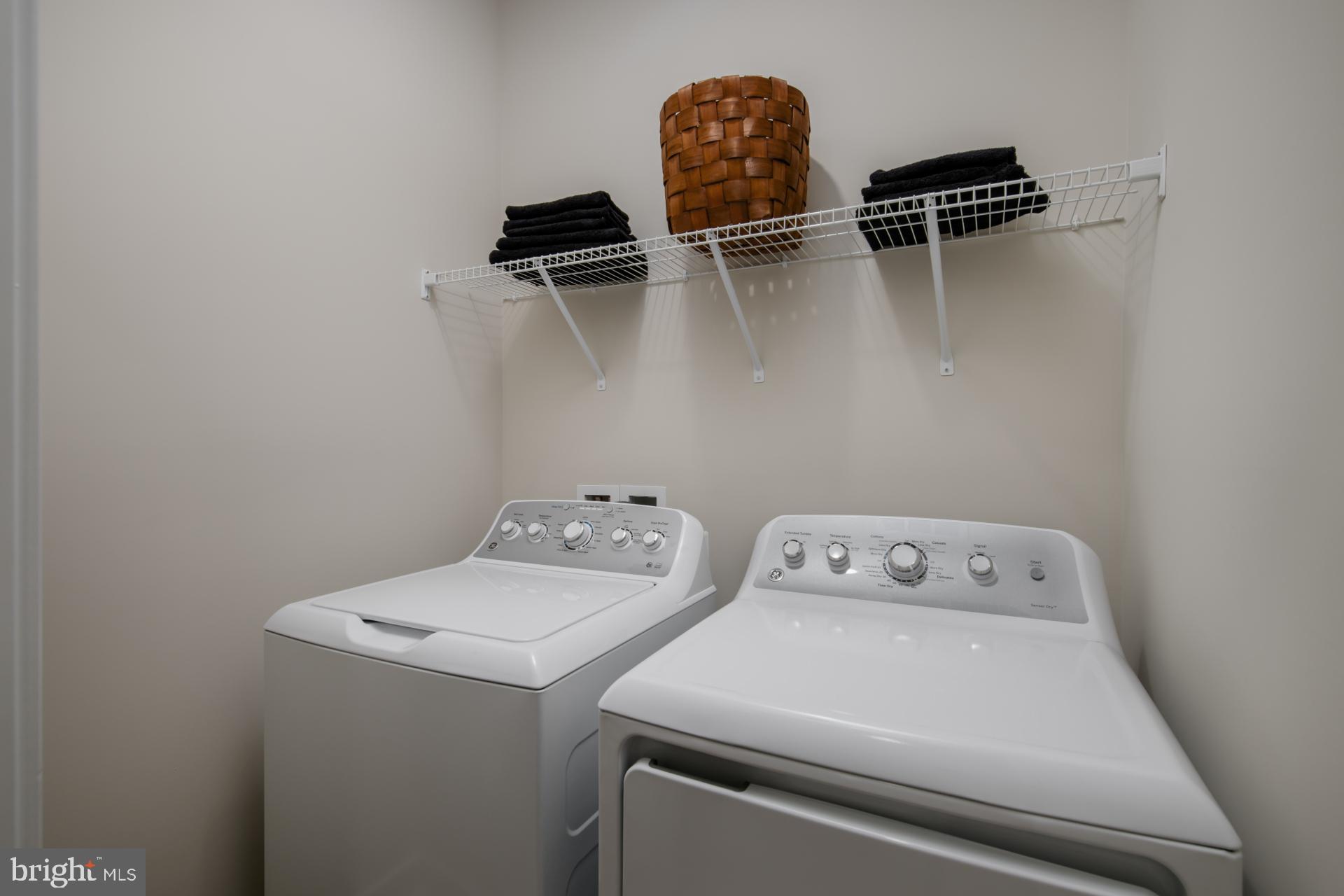 39 Strabane Terrace Ashburn, VA 20147 - Photo 12 of 15 a utility room with dryer and washer