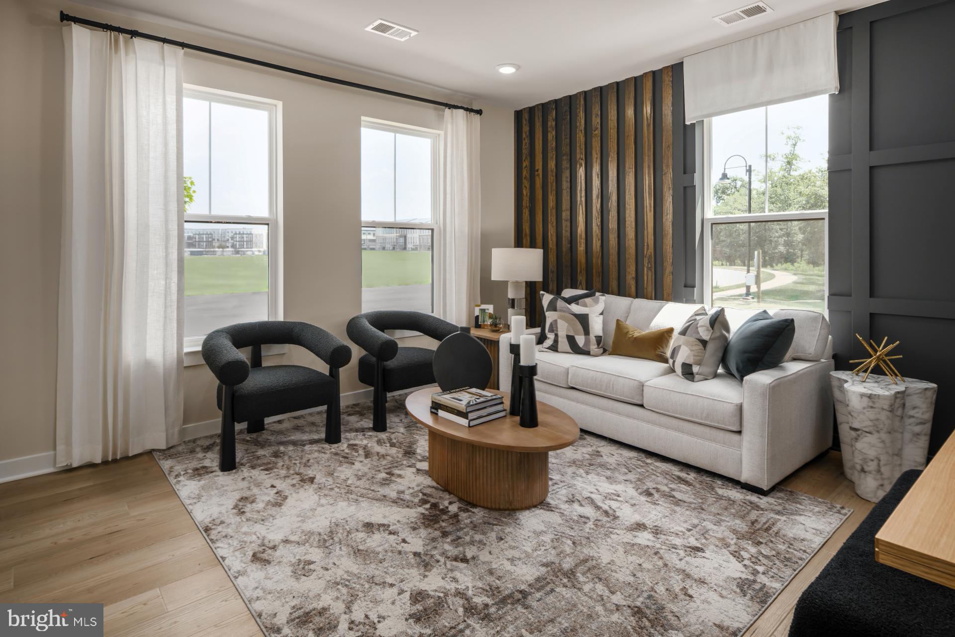 39 Strabane Terrace Ashburn, VA 20147 - Photo 3 of 15 a living room with furniture and a large window