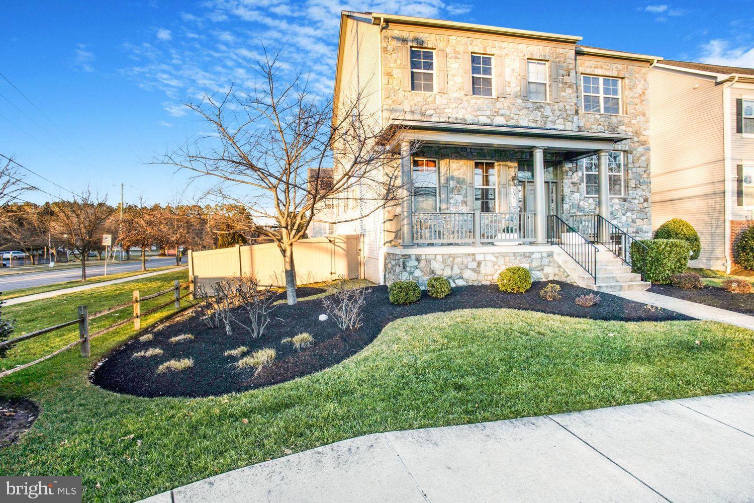 3041 Bel Pre Road Silver Spring, MD 20906 - Photo 2 of 30 a front view of a house with garden