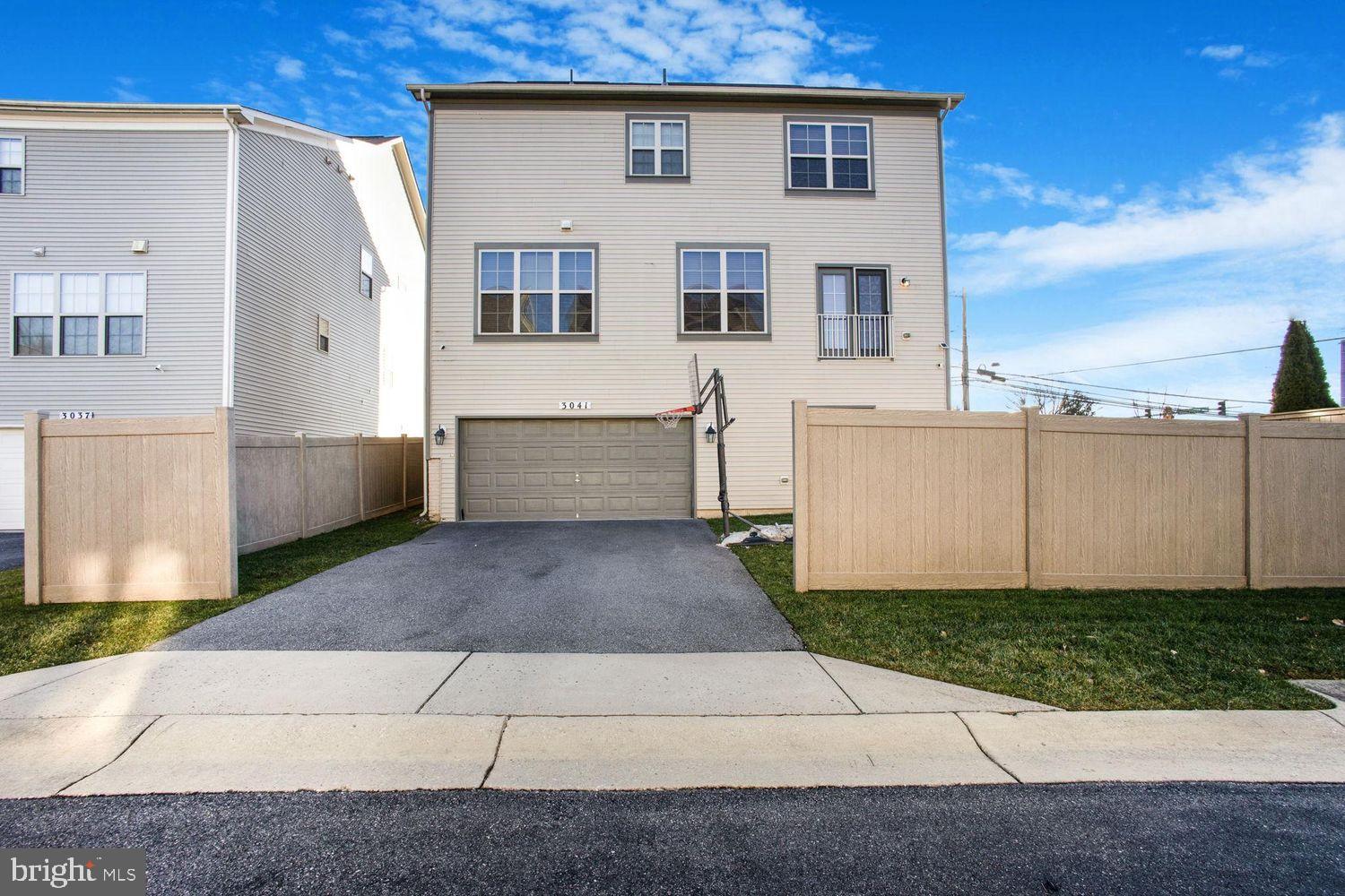 3041 Bel Pre Road Silver Spring, MD 20906 - Photo 30 of 30 a view of a house with a yard