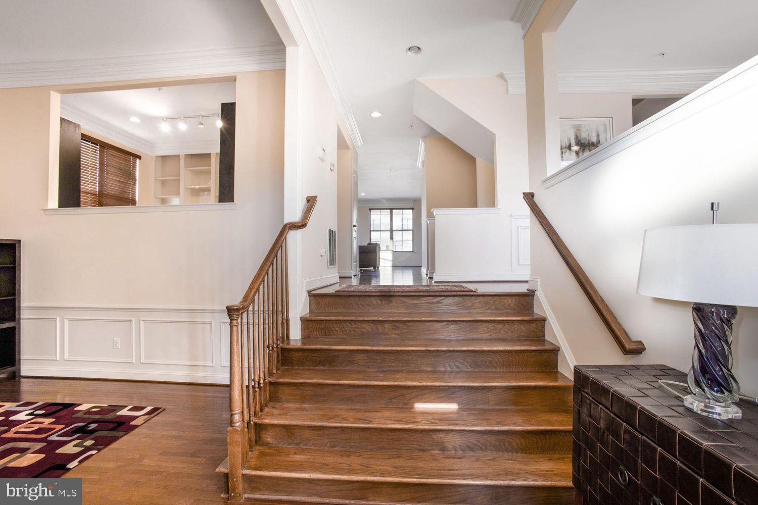 3041 Bel Pre Road Silver Spring, MD 20906 - Photo 4 of 30 a view of entryway and hall with wooden floor