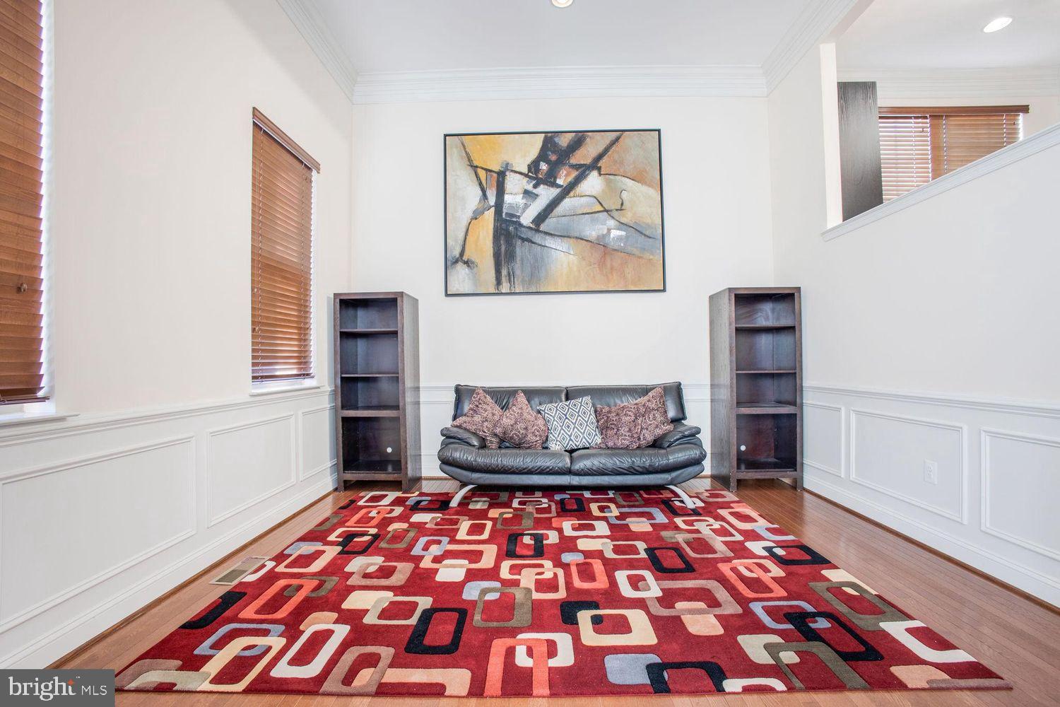 3041 Bel Pre Road Silver Spring, MD 20906 - Photo 7 of 30 a room with a black and white checkered floor