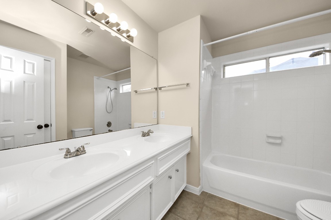 28306 Peper Hollow Lane Spring, TX 77386 - Photo 31 of 39 a bathroom with a tub sink and mirror