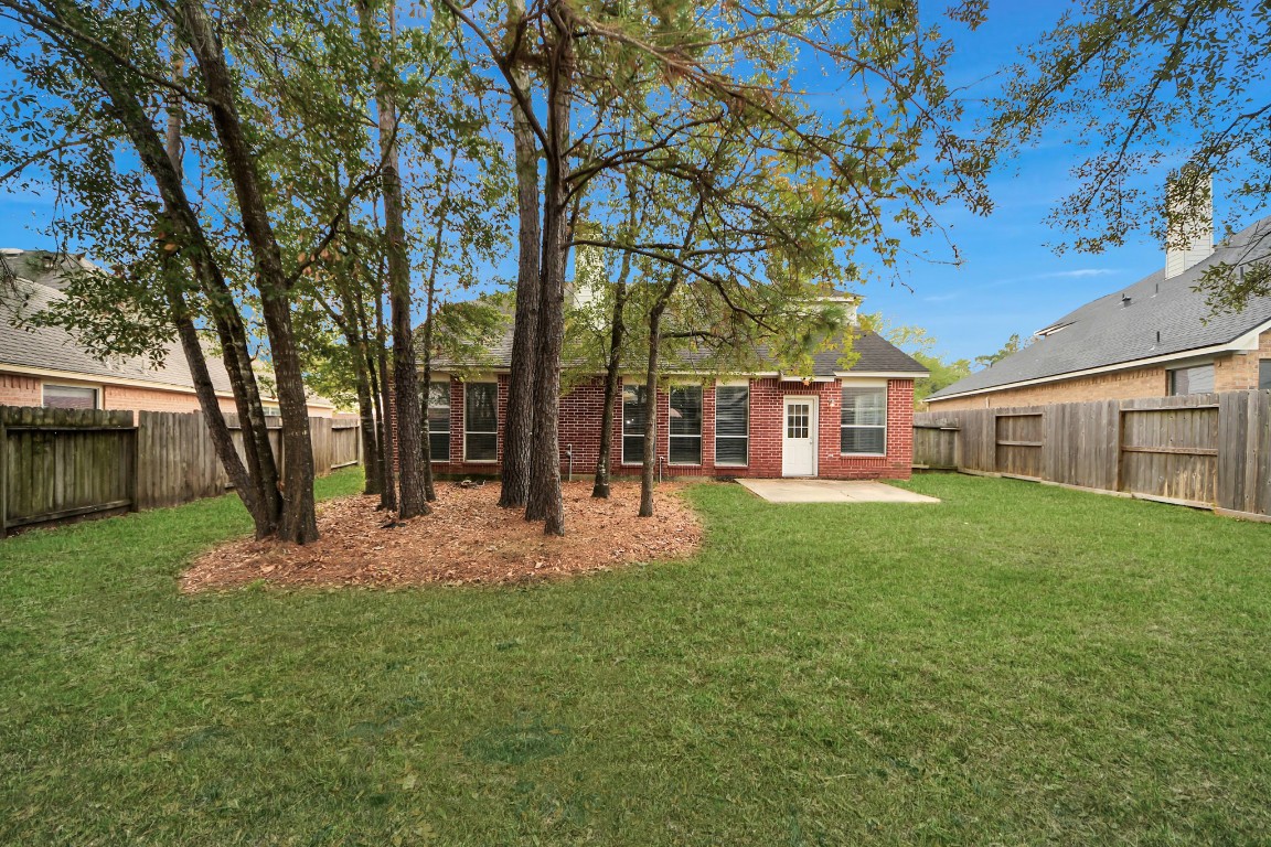 28306 Peper Hollow Lane Spring, TX 77386 - Photo 39 of 39 a view of a yard with a house