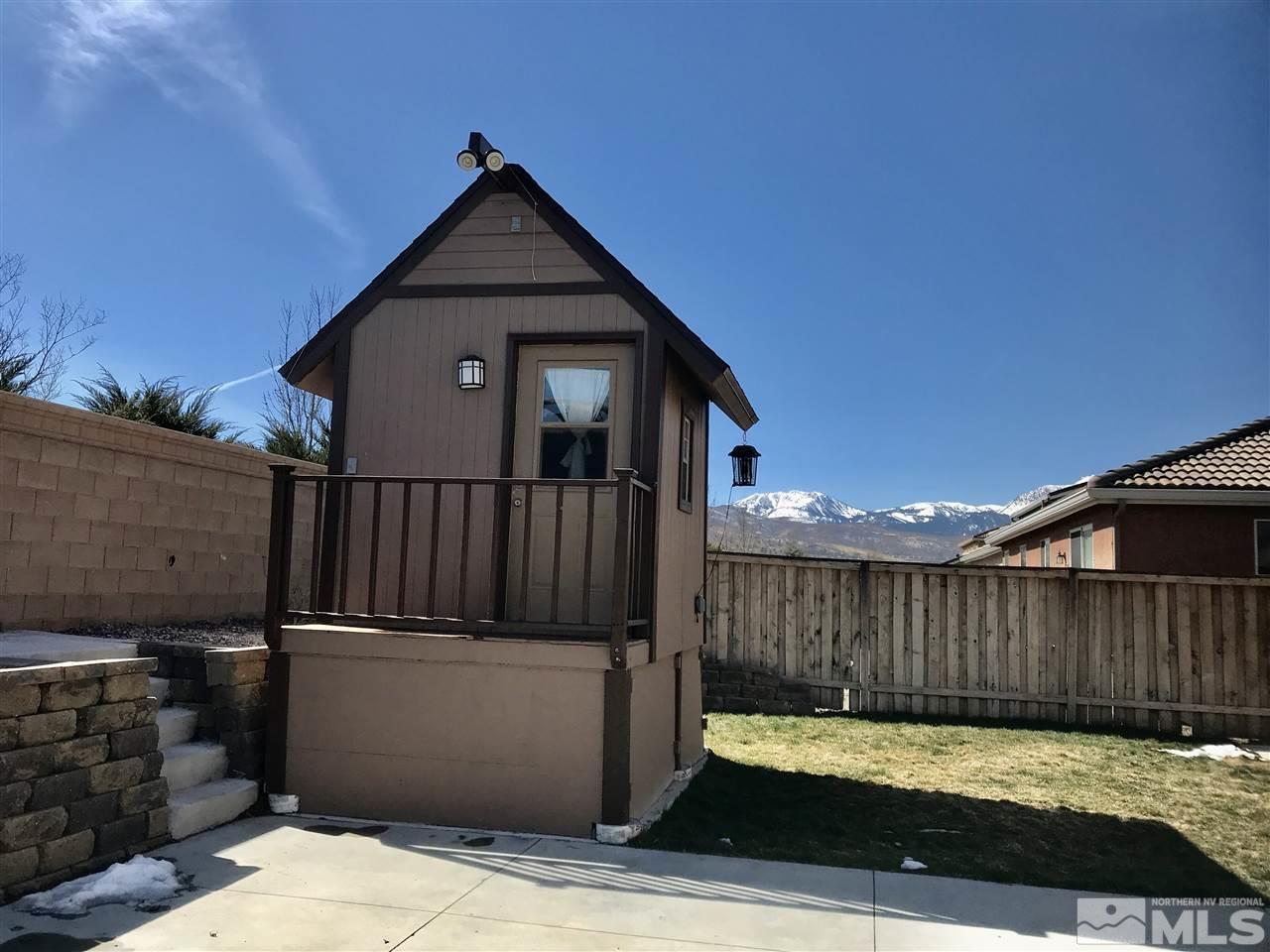 11610 Cervino Drive Reno, NV 89521 - Photo 17 of 20 a view of a house with wooden fence