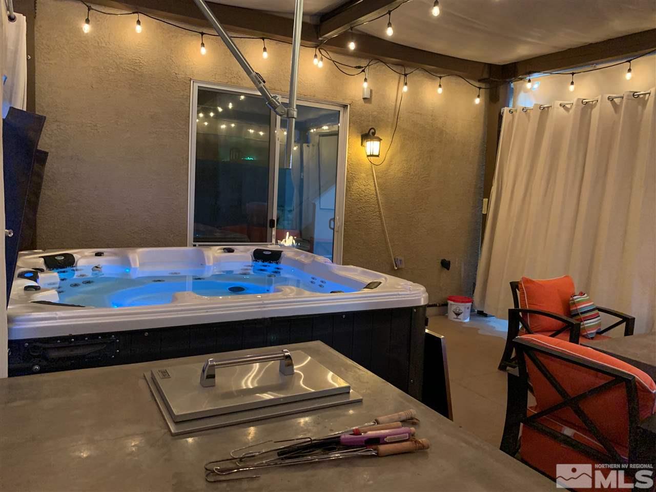 11610 Cervino Drive Reno, NV 89521 - Photo 20 of 20 a room with table chairs and mirrors