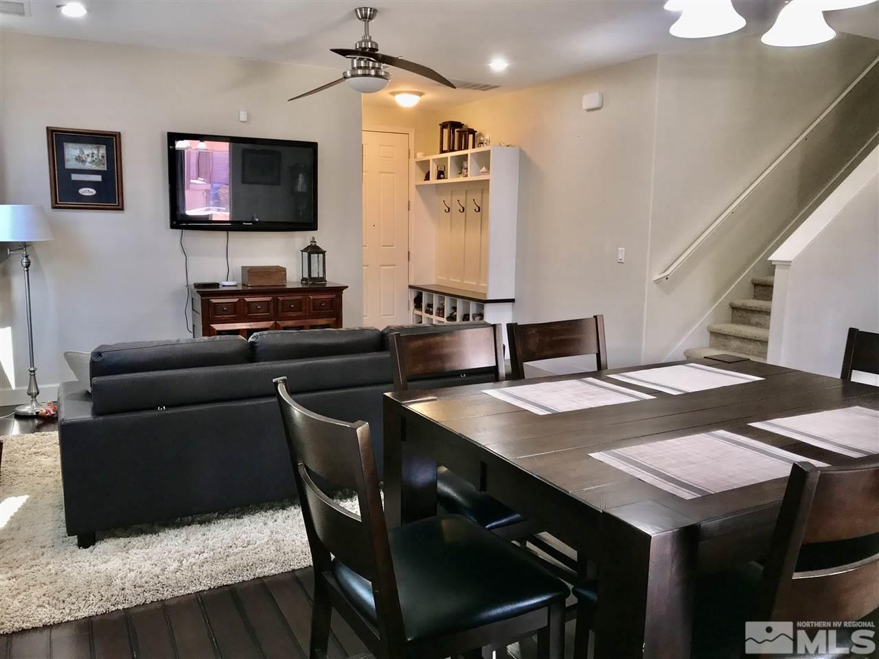 11610 Cervino Drive Reno, NV 89521 - Photo 2 of 20 a living room with furniture and a flat screen tv