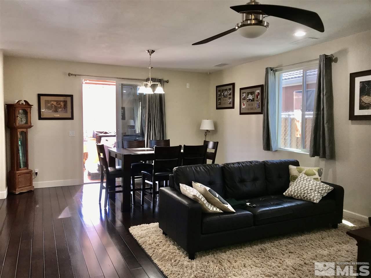 11610 Cervino Drive Reno, NV 89521 - Photo 5 of 20 a living room with furniture and wooden floor