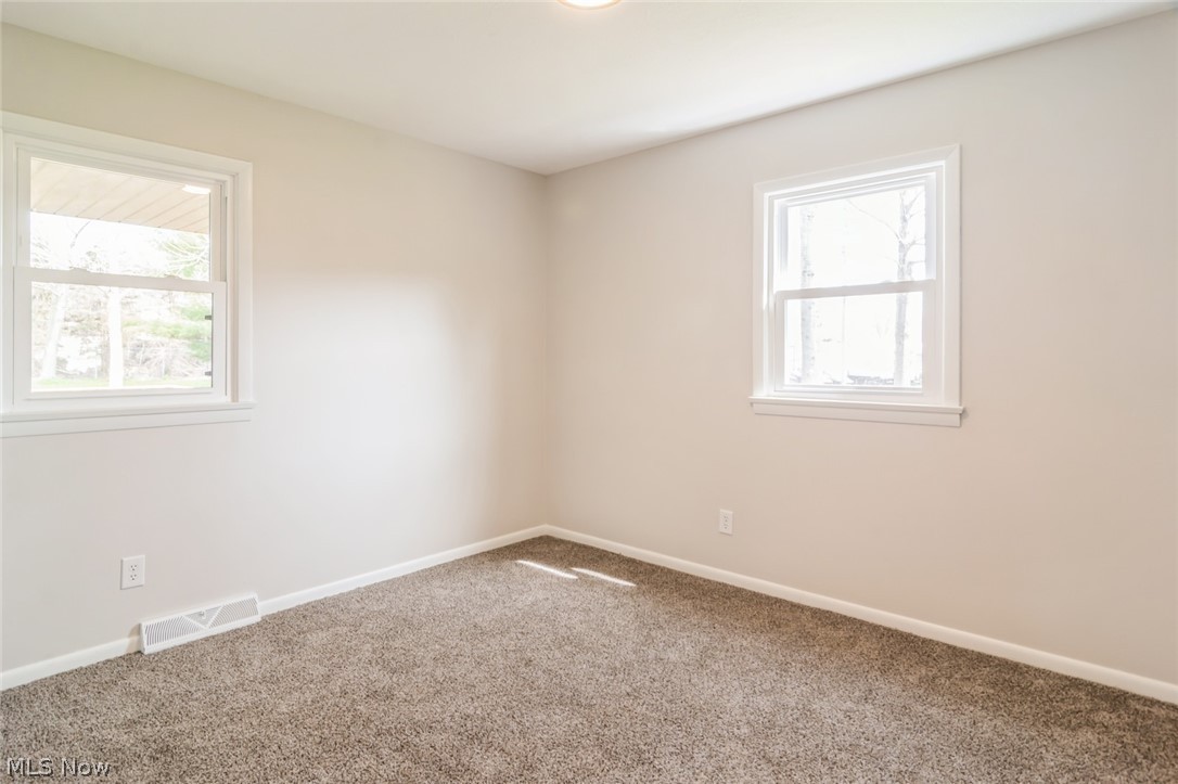 37012 Sugar Ridge Road North Ridgeville, OH 44039 - Photo 13 of 26 View of carpeted empty room