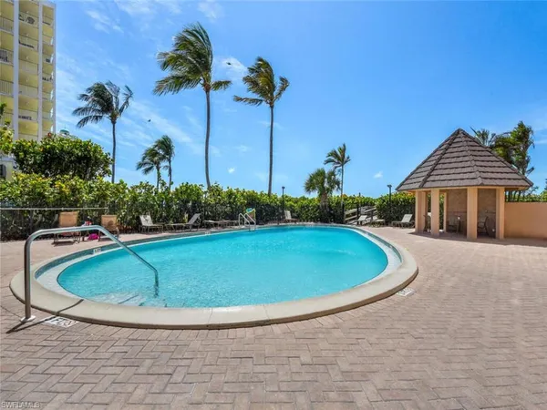 a view of outdoor space and swimming pool