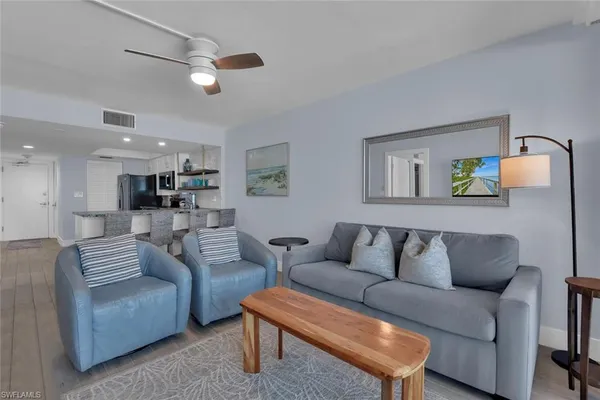 a living room with furniture and a couch