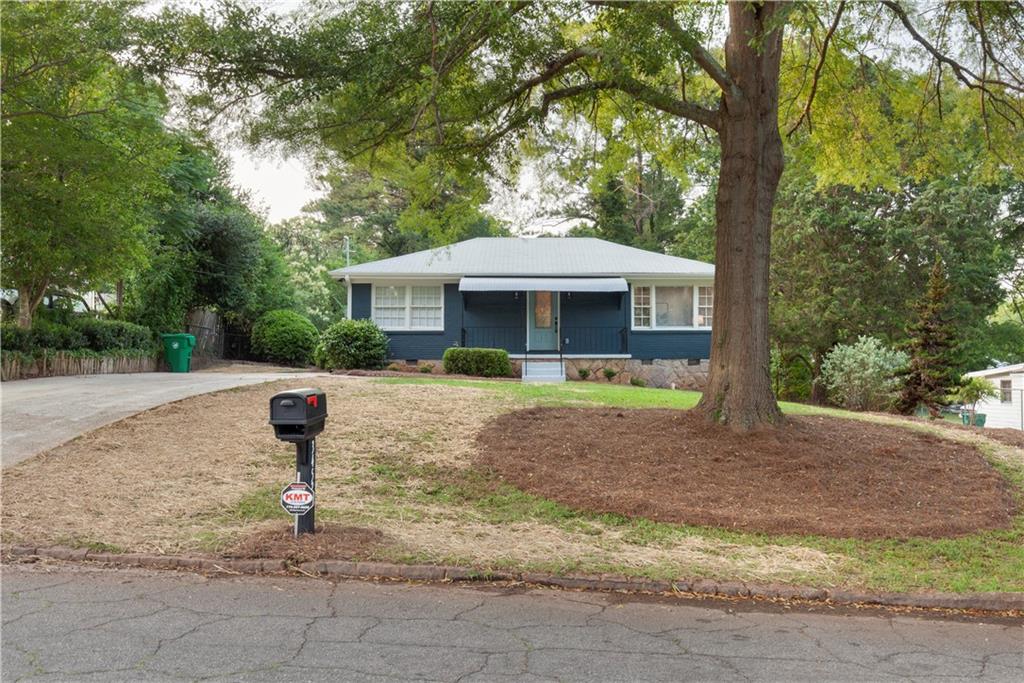 3452 Jackson Drive Decatur, GA 30032 - Photo 1 of 1 a front view of a house with garden