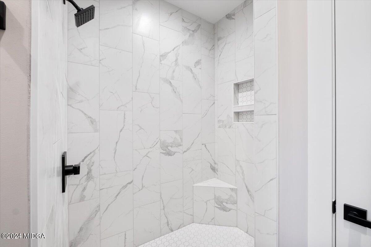 138 Towaliga Road Forsyth, GA 31029 - Photo 12 of 25 a white toilet sitting next to a white sink