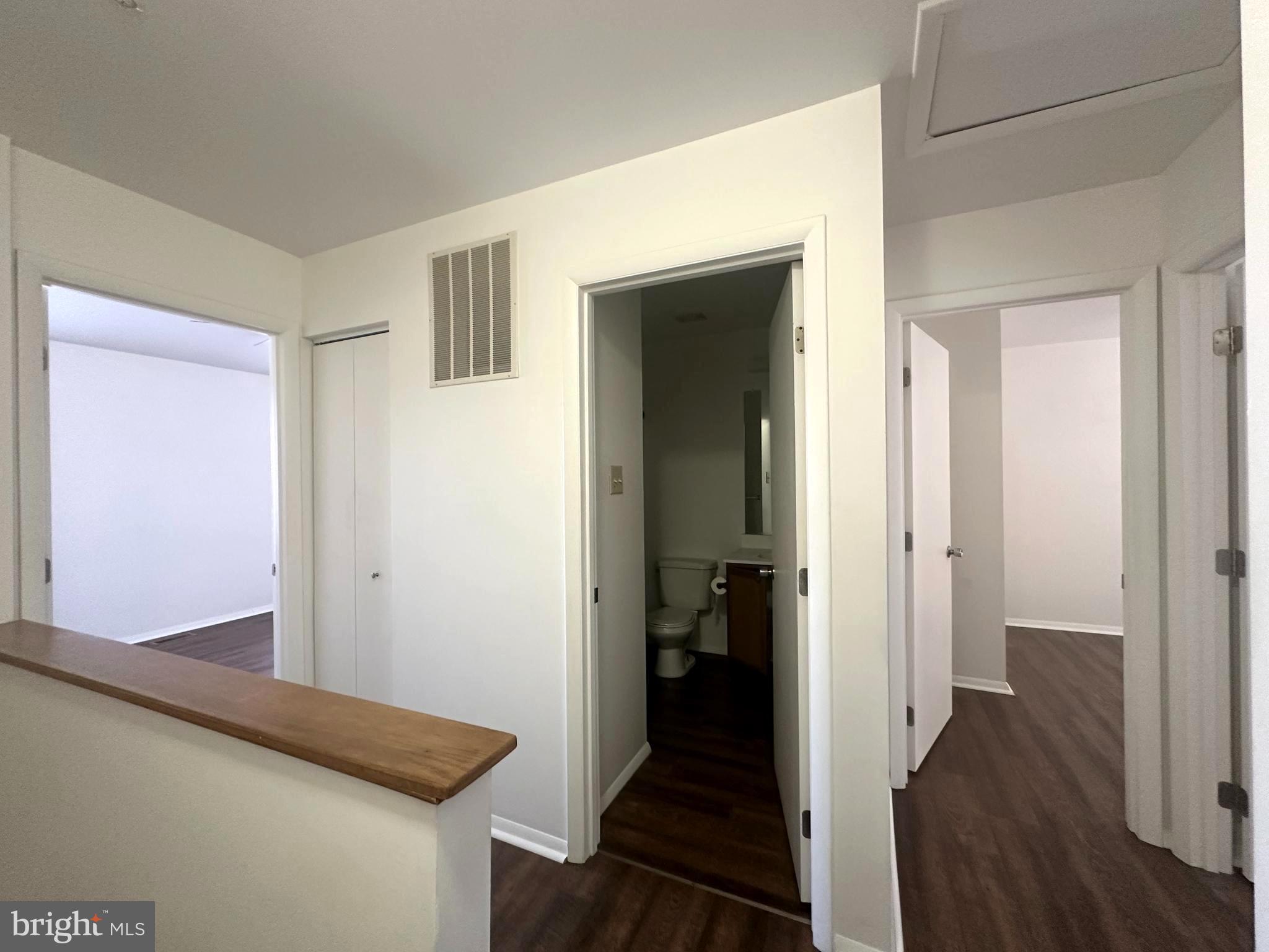 108 Jason's Ridge Smithsburg, MD 21783 - Photo 20 of 32 a view of a hallway with bathroom and wooden floor