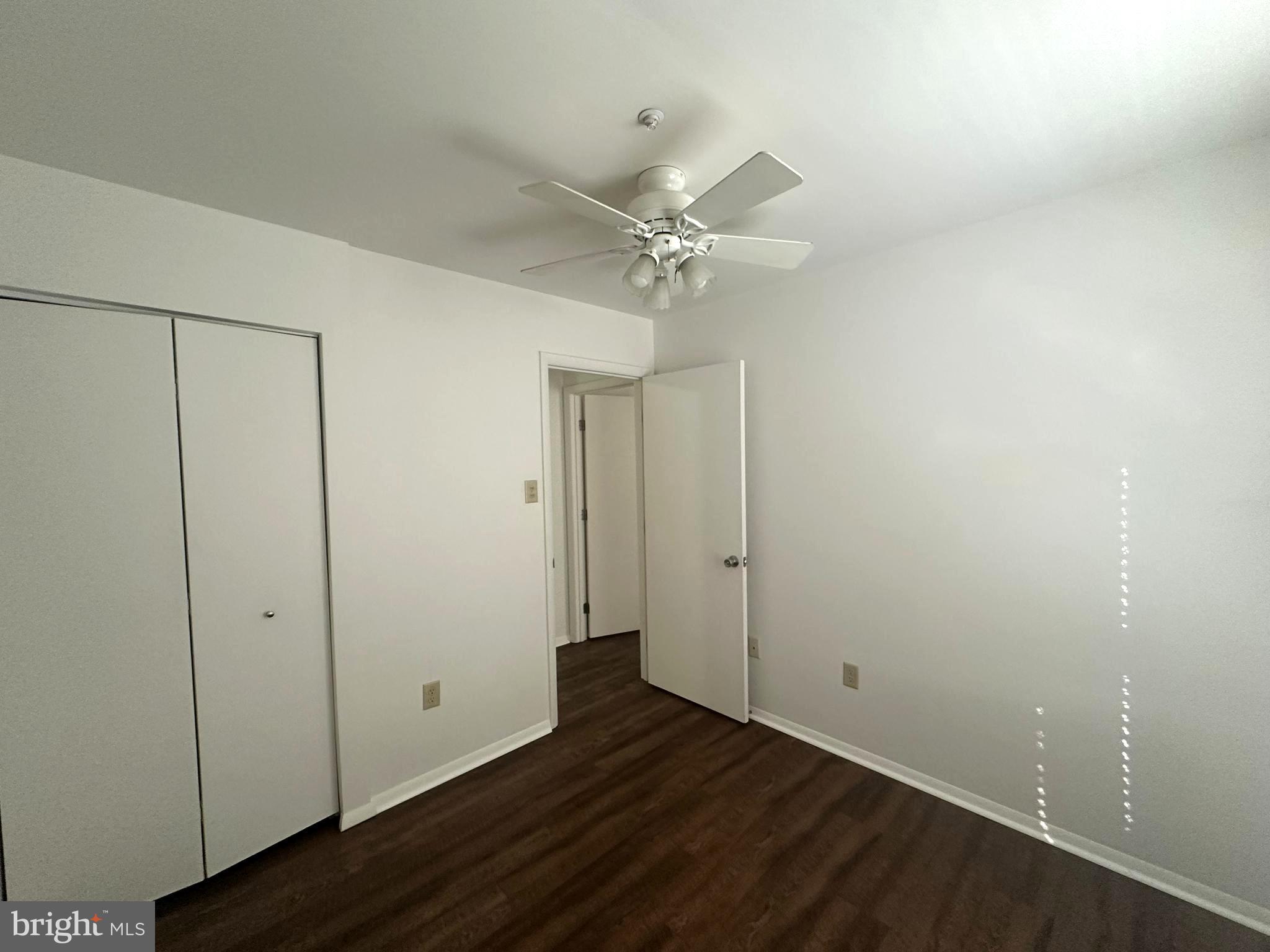 108 Jason's Ridge Smithsburg, MD 21783 - Photo 29 of 32 an empty room with wooden floor and fan
