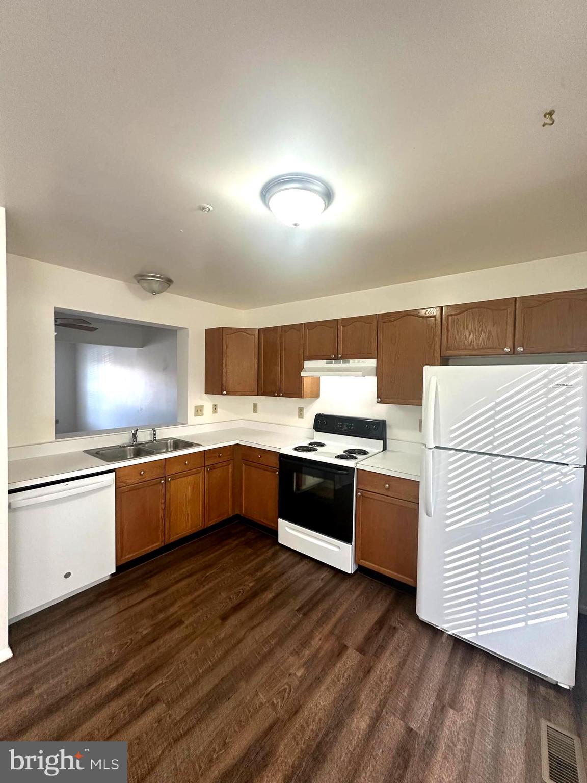 108 Jason's Ridge Smithsburg, MD 21783 - Photo 10 of 32 a large kitchen with a lot of counter space and wooden floor
