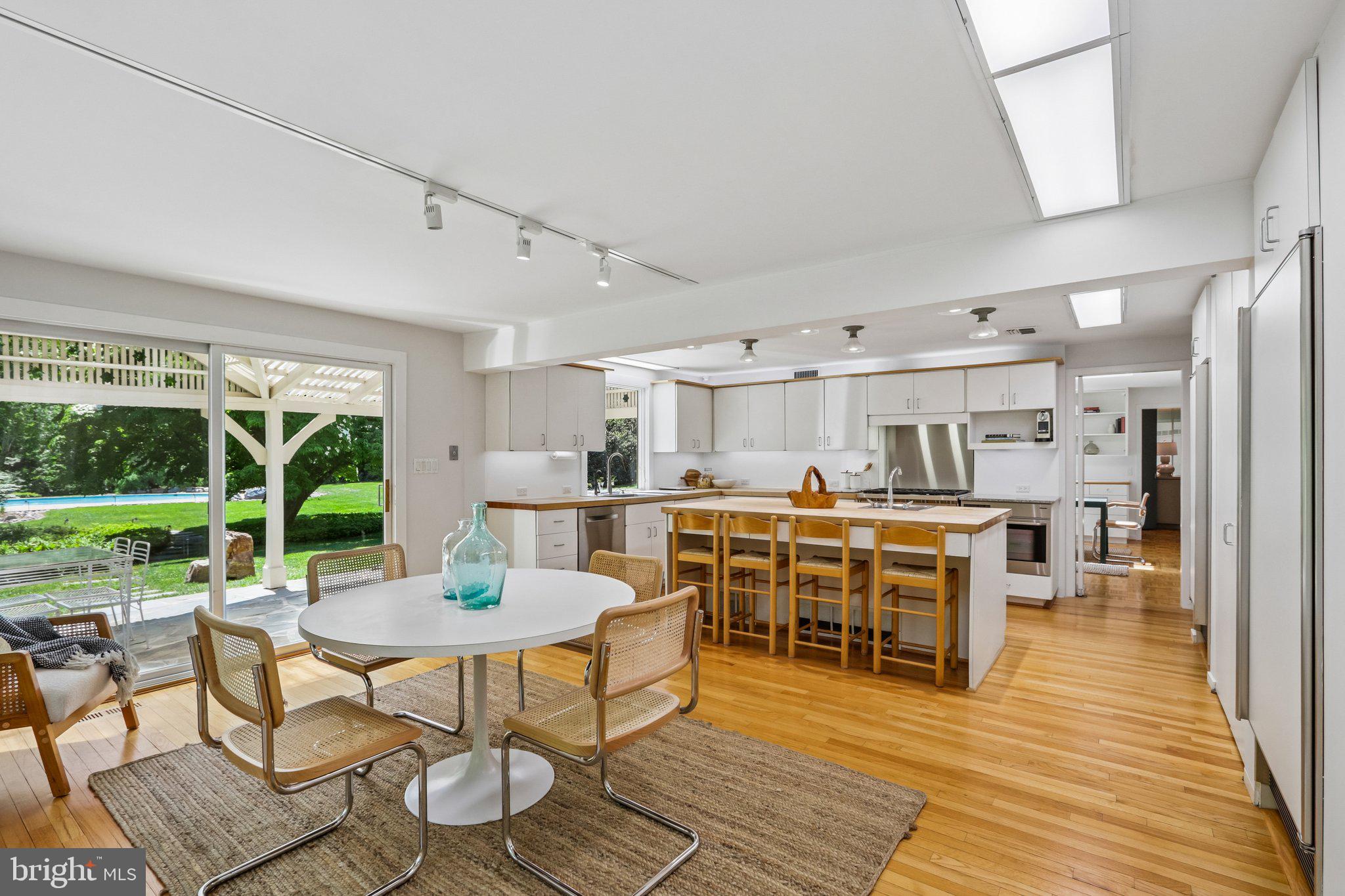 1673 Paper Mill Road Jenkintown, PA 19046 - Photo 22 of 73 a view of a dining room with furniture window and outside view