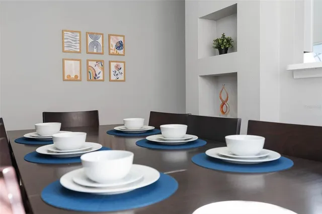 a view of a dining room with furniture