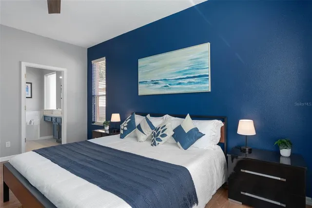 a bathroom with a tub and a shower