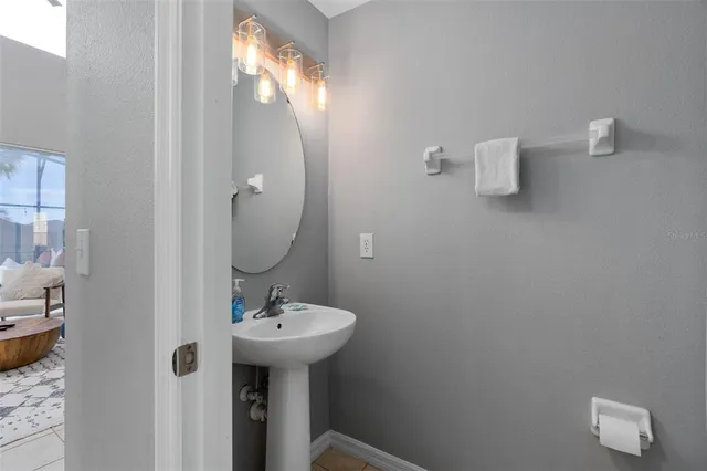 a room with furniture and a chandelier