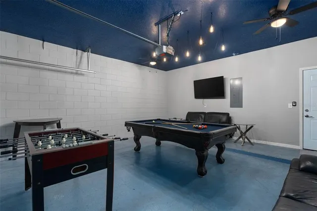 a bedroom with a bed rug and a window