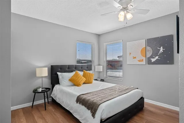 a view of hallway with wooden floor
