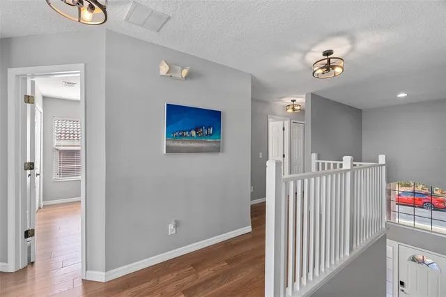 a bedroom with bed and window