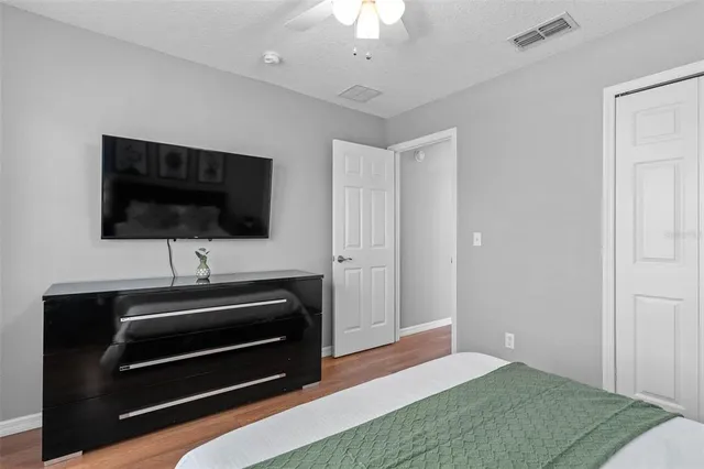 a bathroom with a sink toilet and a mirror