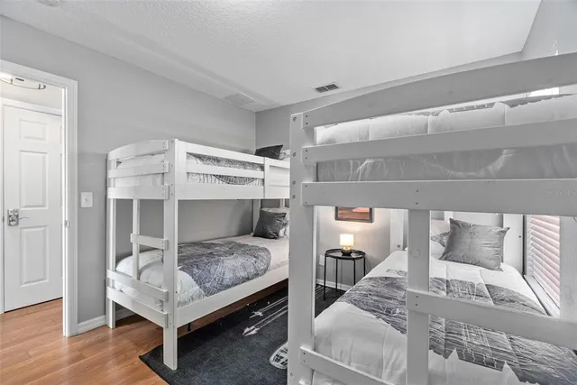 a view of a backyard with a small swimming pool