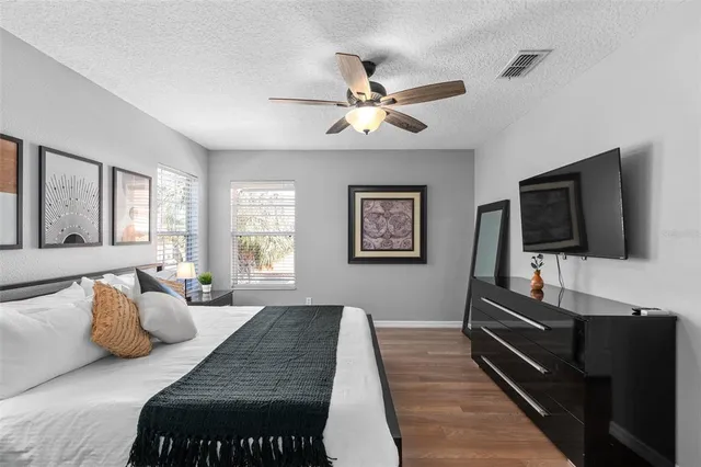 an aerial view of a house with yard