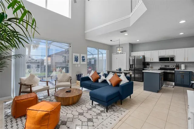 a view of a a dining room with furniture window and wooden floor