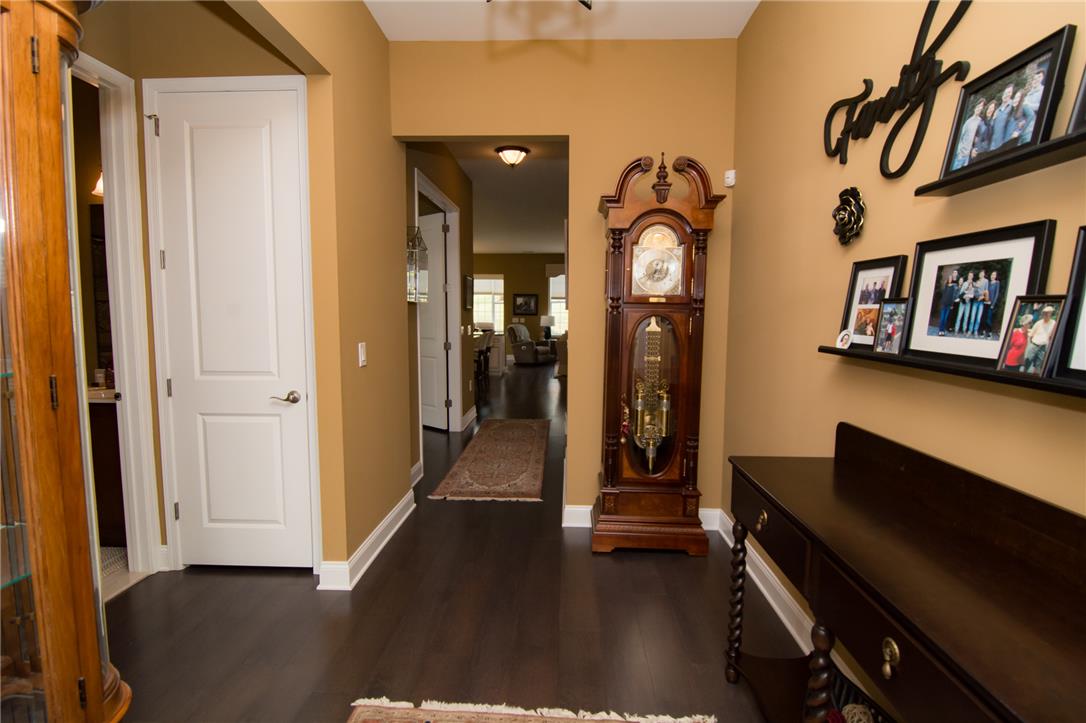 4097 Rutz Lane Allentown, PA 18104 - Photo 2 of 59 Rich dark wood flooring anchors this welcoming entry hall connecting to multiple living areas.