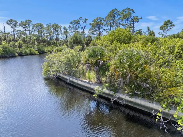 view of a lake with houses