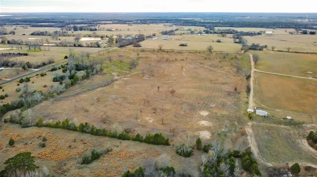 an aerial view of beach and residential space