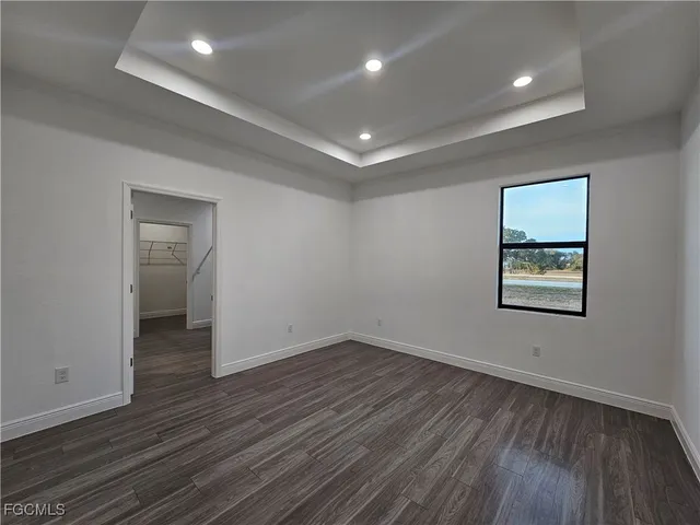 a bathroom with a shower and a toilet