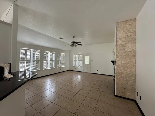 a view of a room with windows