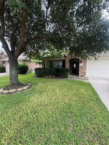 a view of a garden with an outdoor seating