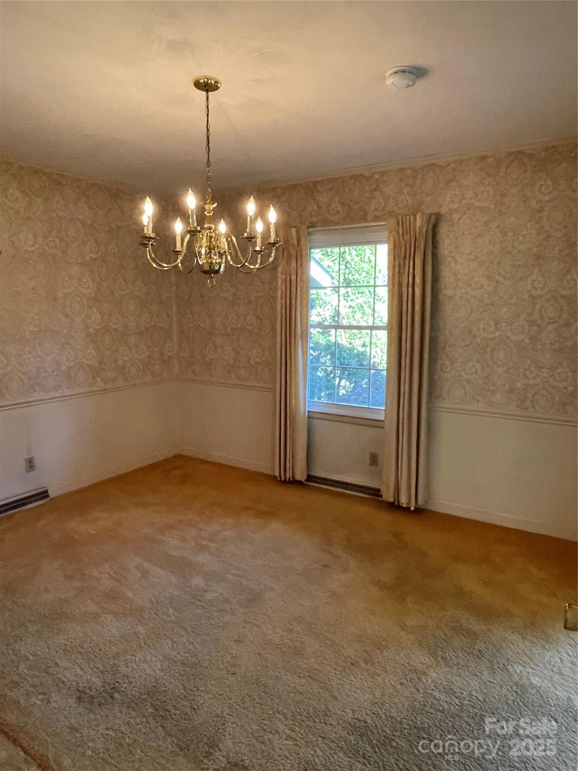 135 Devon Drive Salisbury, NC 28147 - Photo 4 of 16 wooden floor in an empty room with a window