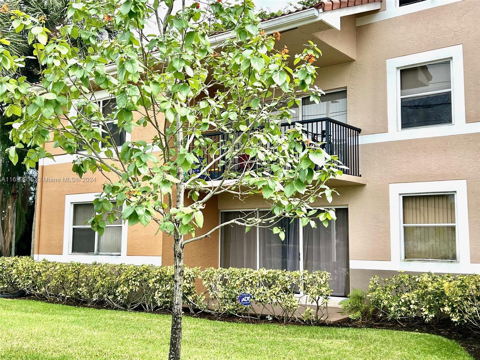 8741 Wiles Road, Unit 107 Coral Springs, FL 33067 - Photo 1 of 16