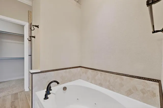 a bathroom with a bathtub