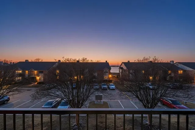 a view of a living room and a floor to ceiling window