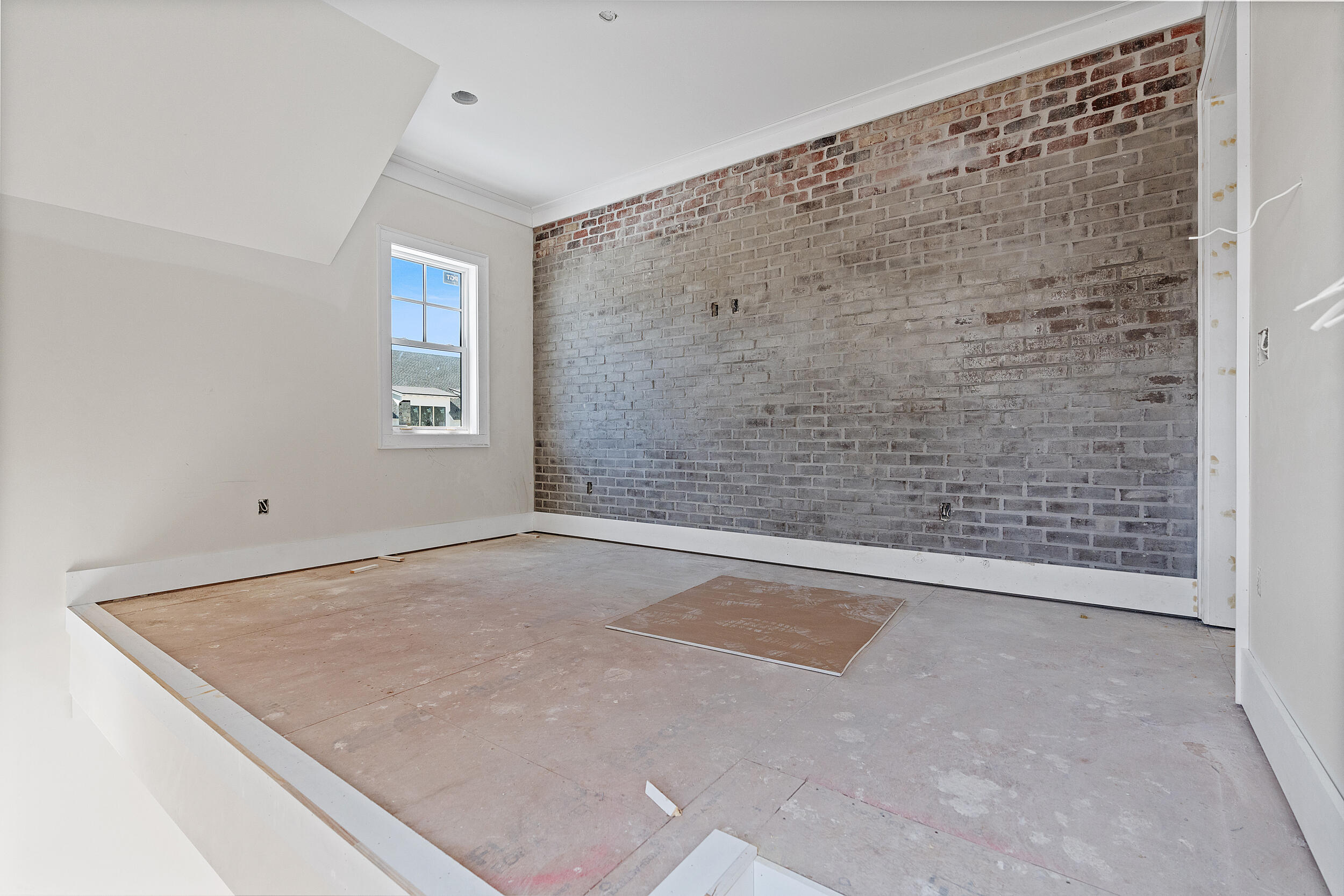 333 Pollard Cove, Unit LOT 96 Watersound, FL 32461 - Photo 11 of 37 an empty room with windows