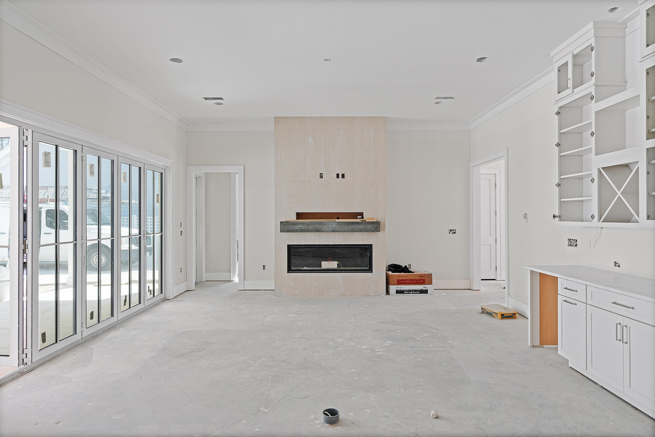 333 Pollard Cove, Unit LOT 96 Watersound, FL 32461 - Photo 4 of 37 a view of an empty room with a fireplace