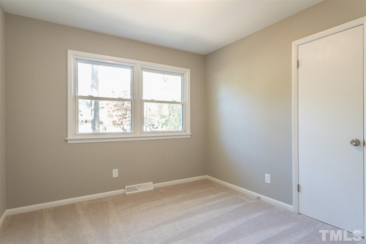 4907 Brentwood Road Durham, NC 27713 - Photo 18 of 27 an empty room with a window