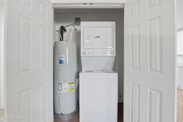 a utility room with dryer and washer